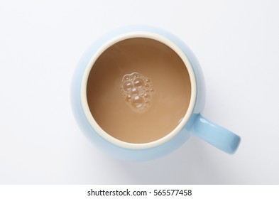 Drink Of Tea In Blue Mug Shot From Directly Above On White Background