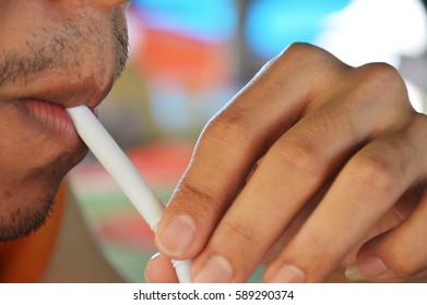 Drink through a straw