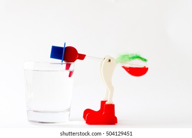 Drinking Bird Toy Drinks