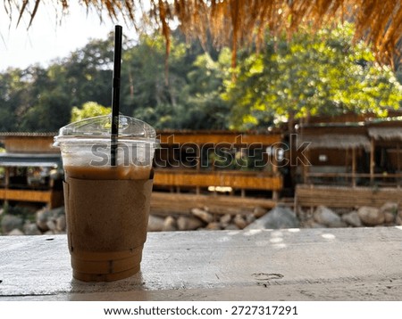 Drinking coffee in a natural setting by a stream is ideal for changing brainwaves and relaxing in the tranquility of the forest.