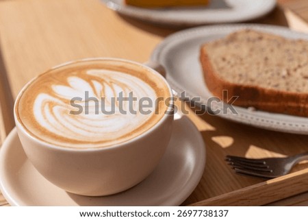 Drinking coffee in a stylish cafe
