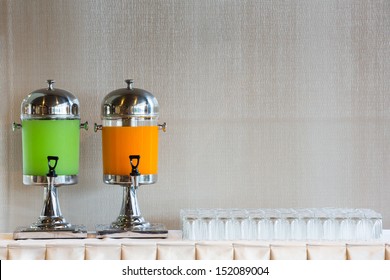 Drinking Dispenser And Glass On Table Ready For Party Time