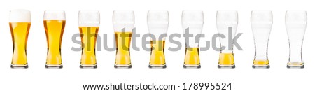 Drinking sequence of beer glasses isolated on white.