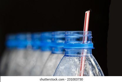 Drinking straws in plastic bottles