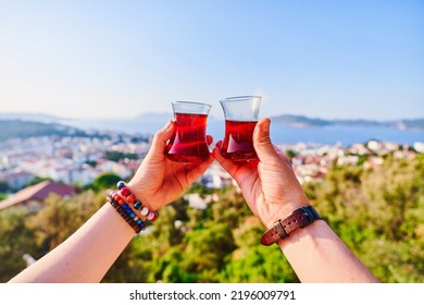 Drinking traditional Turkish tea with a beautiful view at sunny day during vacation holidays - Powered by Shutterstock