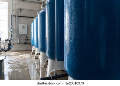 Drinking Water Factory Or Plant Production, Industrial Interior. Large Metal Tanks For Filtering And Potable Water Treatment From Well.