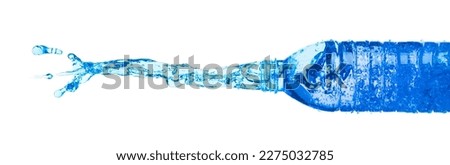 Drinking Water in Plastic Bottle fall fly in mid air, fresh water plastic bottle floating explosion. Fresh water plastic bottles pour throw in air. White background isolated freeze motion high speed