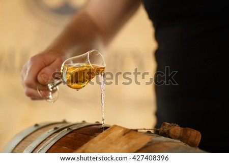 drinking whiskey