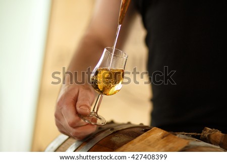 drinking whiskey