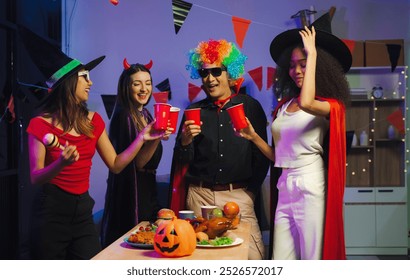 drinks and conversation, social gathering and get together at Halloween party - Powered by Shutterstock