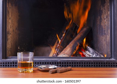 drinks at cozy fireplace on winters evening - Powered by Shutterstock