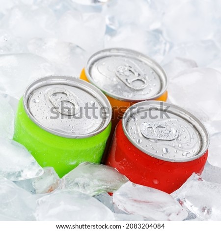 Drinks lemonade cola drink softdrinks in cans with ice cubes square soda
