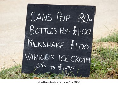 Drinks menu outside on a grass bank