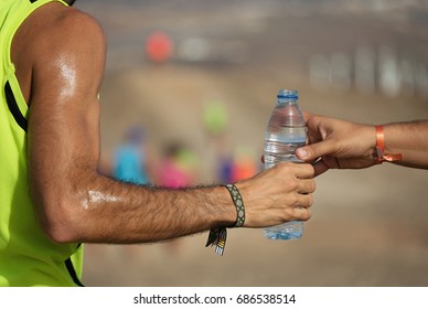 Drinks Station At A Trail Running Marathon, Hydration Drinking During A Race