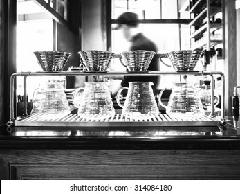 Drip coffee with blurred Barista background restaurant cafe