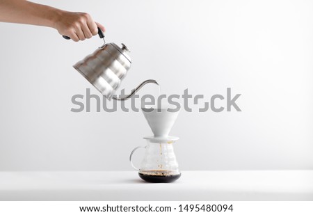 Drip coffee,Drip kettle,Black coffee make a coffee White scene