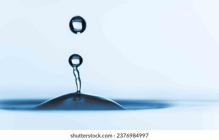 Drip Dynamics: Unveil the dynamic physics at play during a droplet's descent into the water.