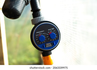 drip irrigation timer in the greenhouse close-up.