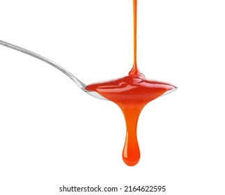 Drip Of Red Sauce In A Spoon On A White Background