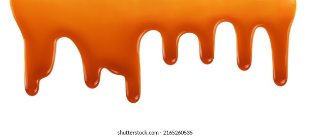 Dripping caramel drops of sweet sauce isolated on white background. Melted caramel sauce - Shutterstock ID 2165260535
