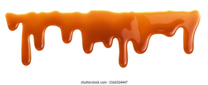 Dripping caramel drops of sweet sauce isolated on white background. Melted caramel sauce - Shutterstock ID 2166324447