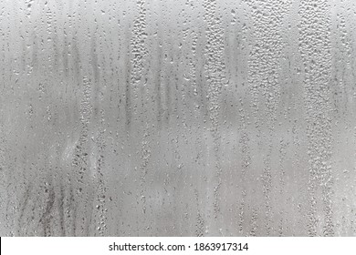 Dripping Condensation, Water Drops Background Rain drop Condensation Texture. Close up for misted glass with droplets of water draining down  - Powered by Shutterstock