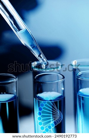 Dripping sample from dropper into test tube with illustration of DNA in laboratory, closeup