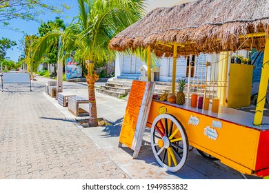 Drivable orange tropical juice shop on wheels in Playa del Carmen Mexico - Powered by Shutterstock