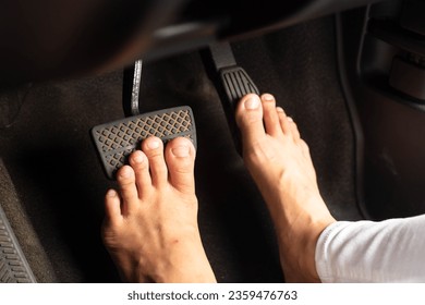 Drive Barefoot, the feet of a woman driving barefoot violates the law. Careless driving