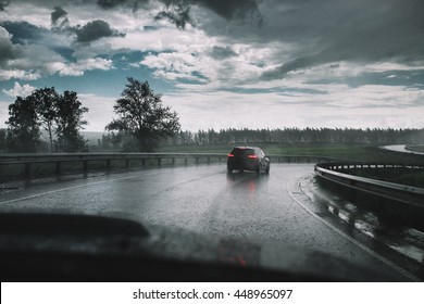 Drive Car In Rain On Curve Asphalt Wet Road