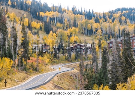 Drive up to Deer Valley Resort in Utah on beautiful golden autumn day. 