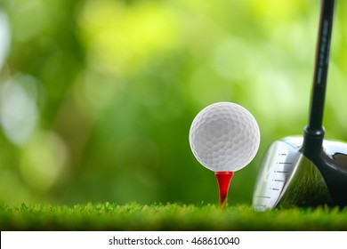 drive a golf ball on tee - Shutterstock ID 468610040