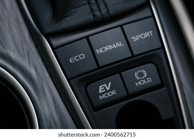 drive mode(Normal, ECO and Sport), EV mode, brake hold buttons in modern hybrid electric vehicle