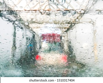 Drive Through In Automatic Car Wash Machine.