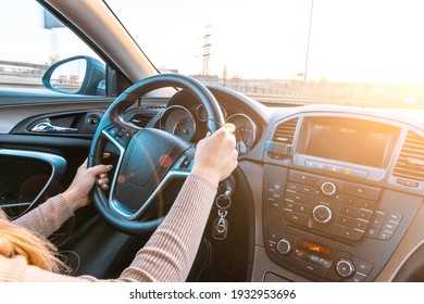 Driver car. Fun drive in winter vacation ride day. Happy young woman have road travel trip inside car in sunny day - Powered by Shutterstock