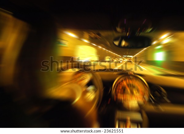 The driver in car in a\
tunnel