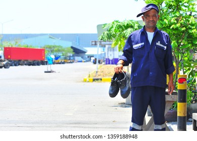 The Driver is carrying safety shoes. - Powered by Shutterstock