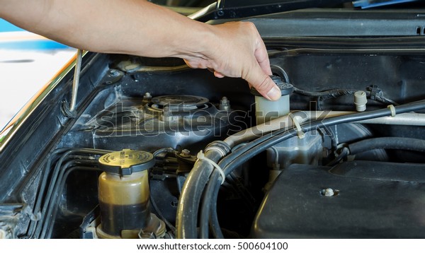 Driver checking the car before used or buy and\
sell,machanic service\
