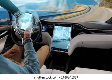 Driver controls an autonomous car using a smartphone