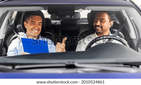 Similar – Image, Stock Photo man in driving car with arms out of the window