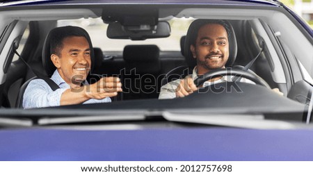 Similar – Image, Stock Photo man in driving car with arms out of the window