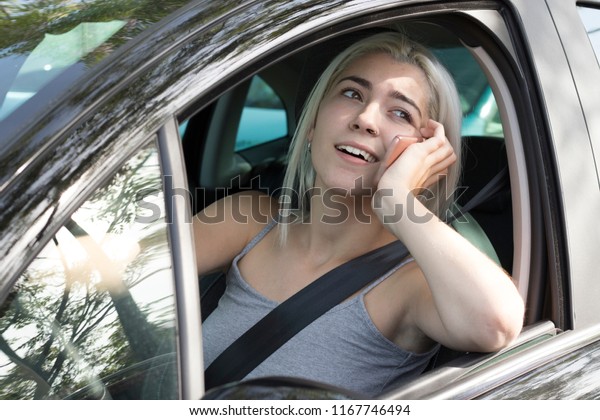 Driver\
distracted by calling on the phone, driving a\
car