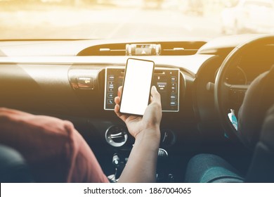 Driver Hand Holding Phone With White Split Screen