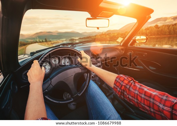 Driver hands on the\
wheel