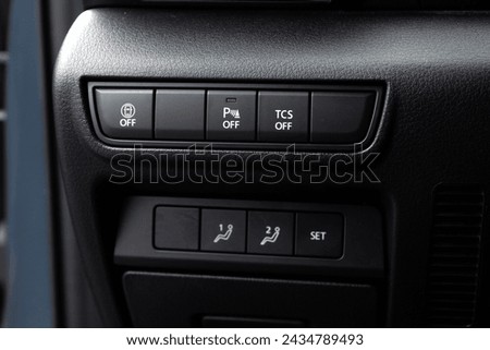 Driver Knee Pad Panel modern car. ESP off Switch. Car light switch. Control buttons combination Details. Dimming light button.