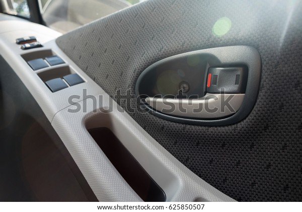 A driver leave car door\
unlocked during driving. To be safety, all cars should be locked by\
manually or automatically lock during driving and leaving the\
car.