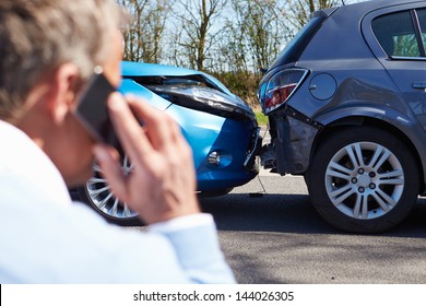 Driver Making Phone Call After Traffic Accident