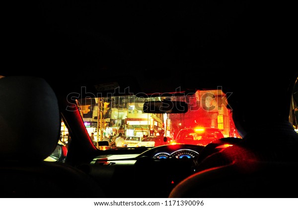 ๋Indian\
driver On the street at night ,Jaipur\
Rajasthan.