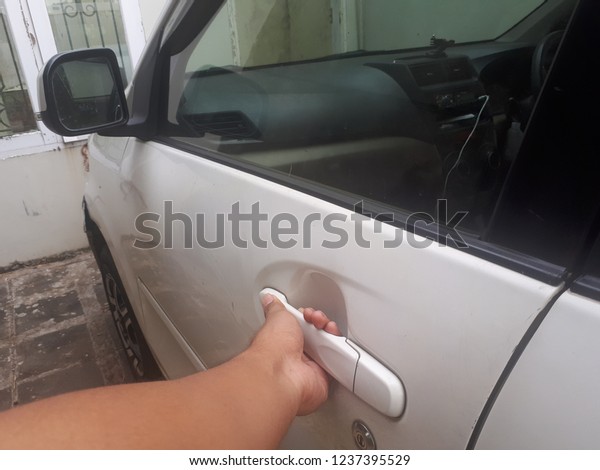 Driver opening car\
door