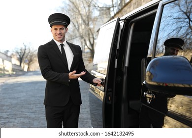 Driver Opening Door Of Luxury Car. Chauffeur Service